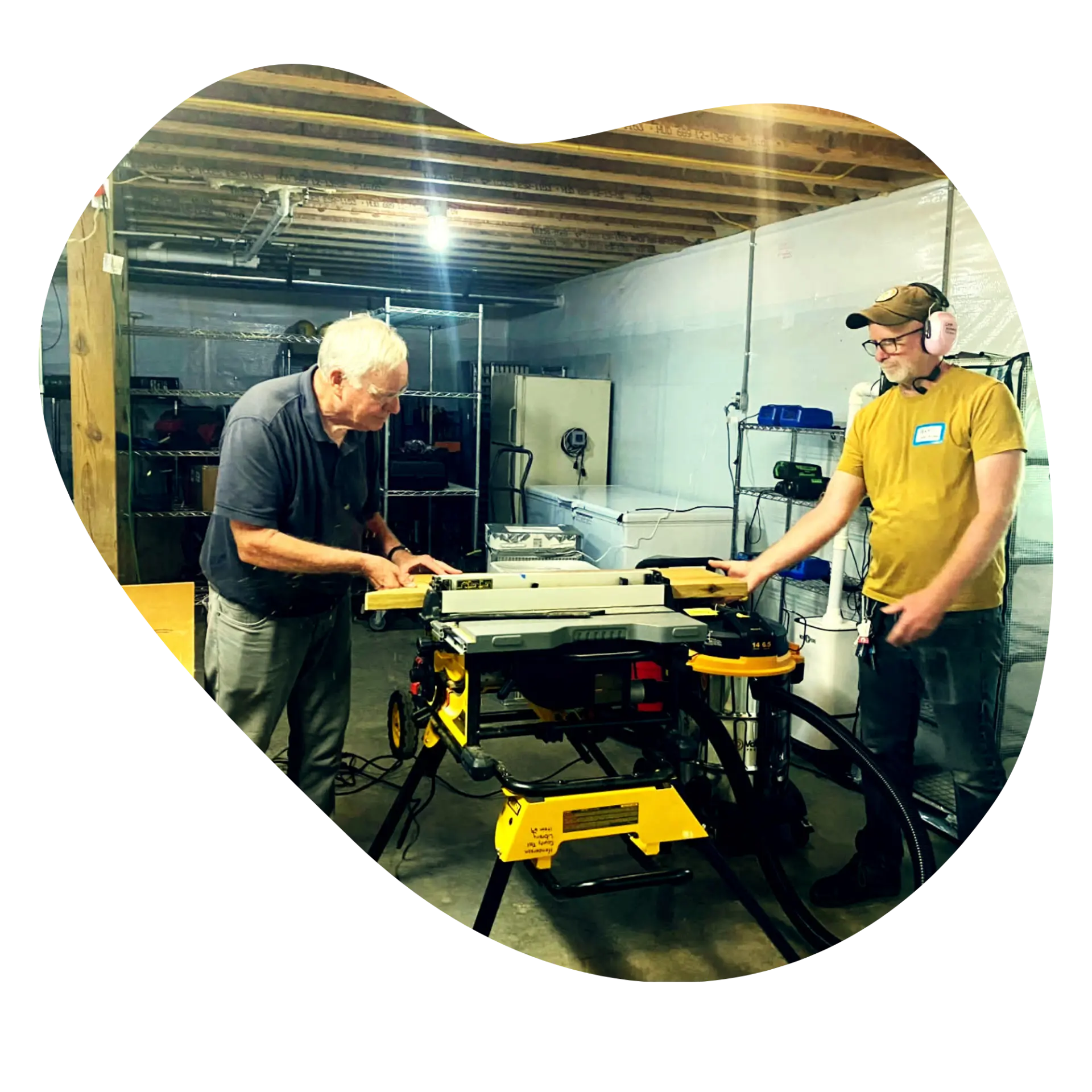 Volunteers working together in the community tool library workshop